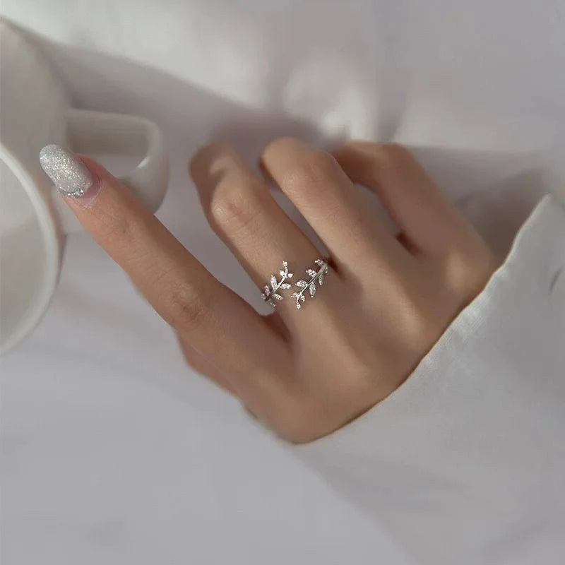 EPSINIA™ “Olive Grace” Ring — 925 Sterling Silver Adjustable Olive Branch Ring with Zircon · Korean Romantic Open Design