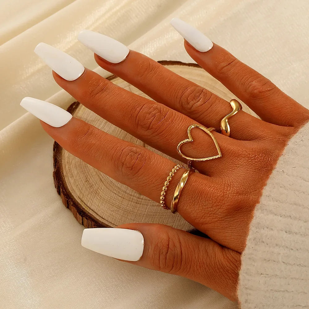 EPSINIA™ “Wave Leaf” Set — 11-Piece Geometric Hollow Ring Collection · Minimalist Gold Knuckle & Band Rings for Women and Men