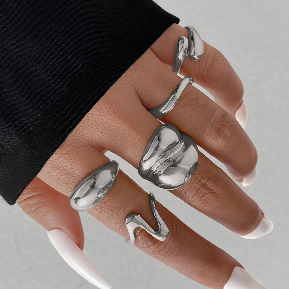 EPSINIA™ “Aqua Lines” Set — 15-Piece Irregular Metal Rings · Smooth Water Droplet Design · Unisex Retro Boho Jewelry Collection