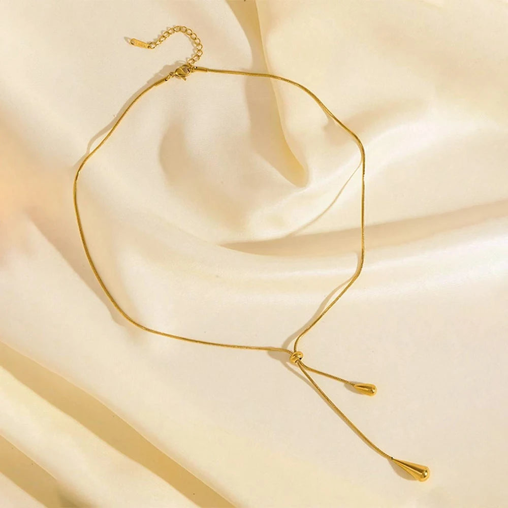 EPSINIA “Cascade” Necklace — Adjustable Stainless Steel Tassel with Water Drop Charm
