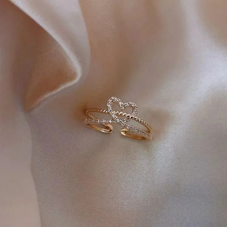 EPSINIA™ “Twin Hearts” Ring — Minimalist Gold-Plated Copper Ring with Cubic Zirconia Double Heart Design · Elegant Jewelry for Women