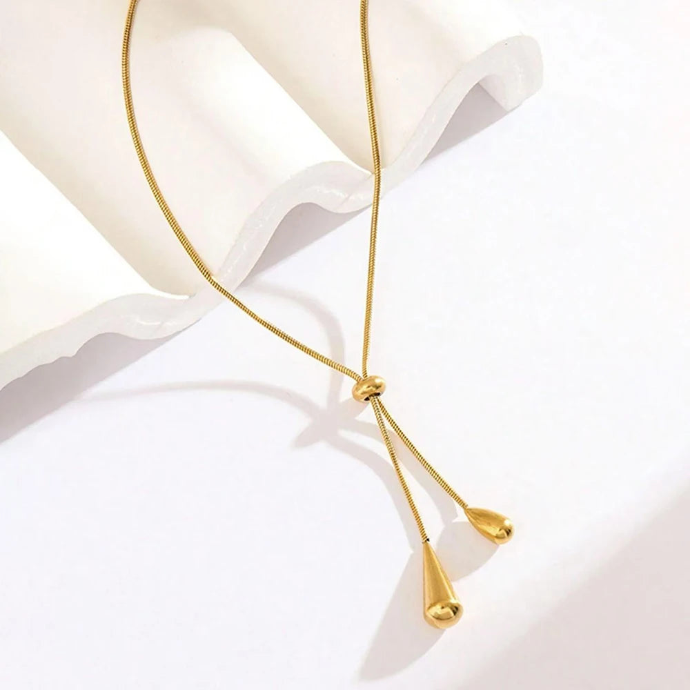 EPSINIA “Cascade” Necklace — Adjustable Stainless Steel Tassel with Water Drop Charm