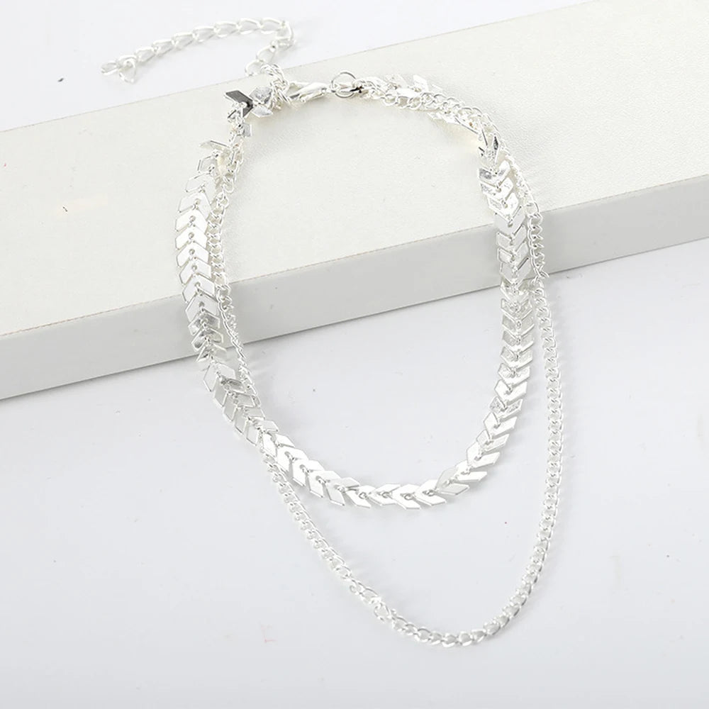 EPSINIA “Voyager” Necklace — 2-Layer Gold Fishbone Chain with Airplane Pendant